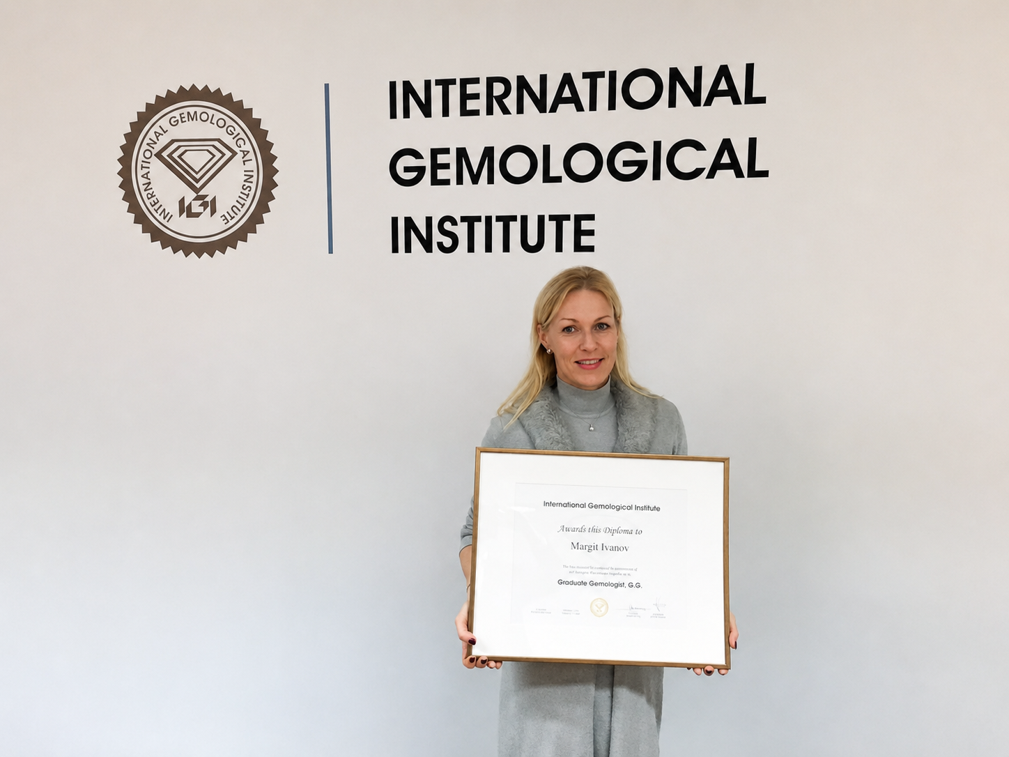 Certified gemologist holding IGI diploma